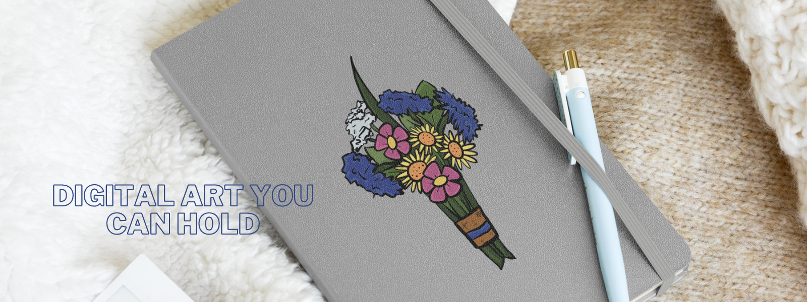 A close up shot of the bouquet art print hardcover notebook and text saying, "Digital art you can hold"