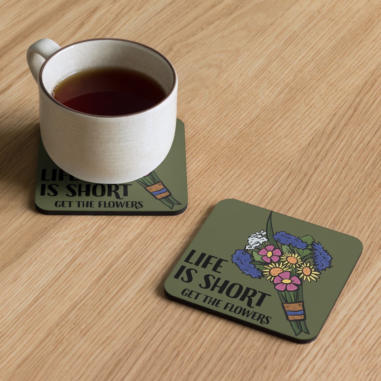 A pair of coasters have illustrated flower bouquets and the words, "Life is short. Get the flowers."