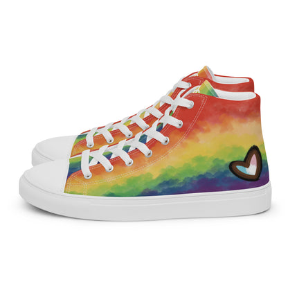 Left side view: A pair of high top shoes with rainbow striped clouds on the sides and a double heart in black and brown with the trans flag colors inside.