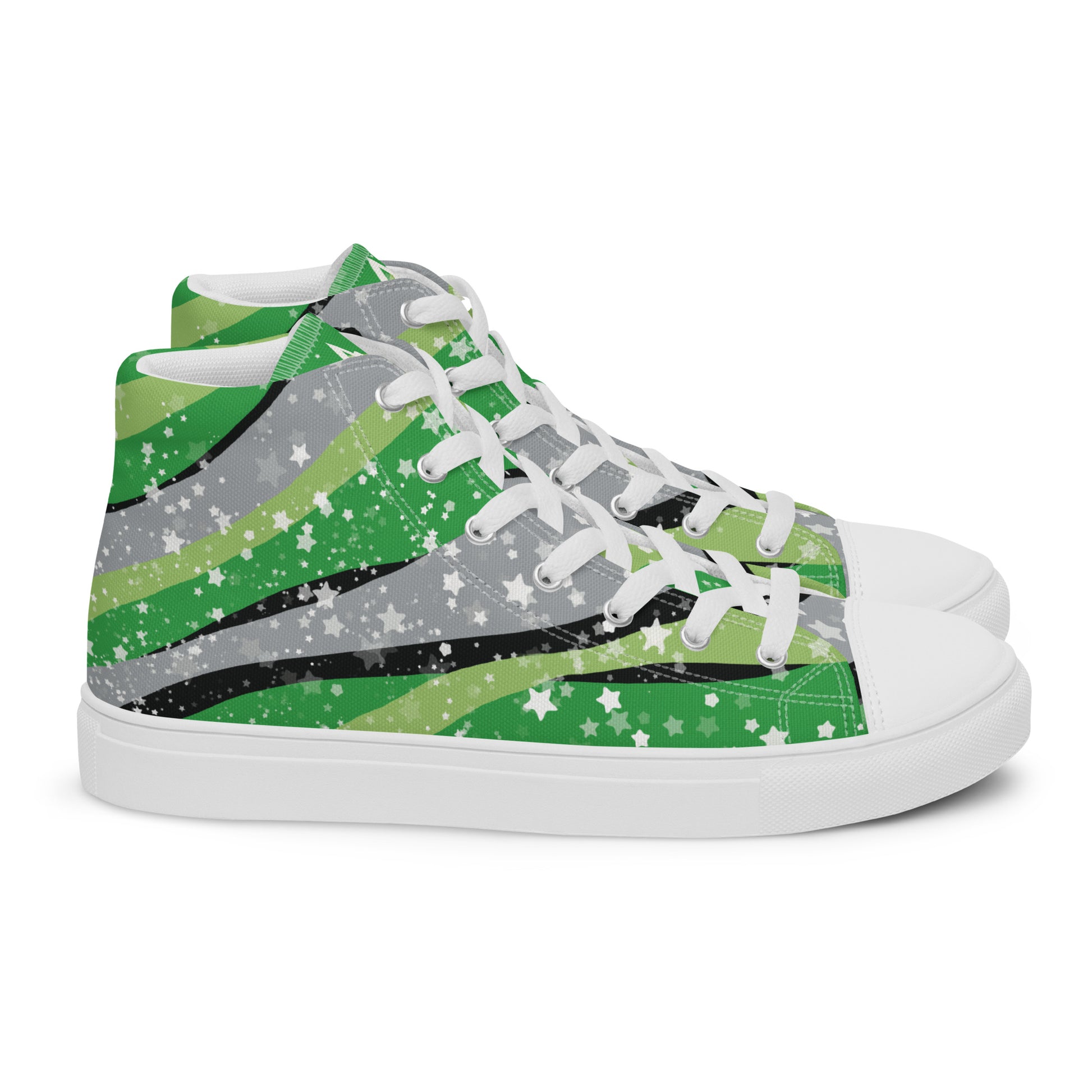Right view: a pair of high-top shoes with ribbons of the greens, grey, and black of the aromantic pride flag coming from the heel and expanding towards the laces with an explosion of stars over it, white accents, and the Aras Sivad Studio logo in white on the tongue.