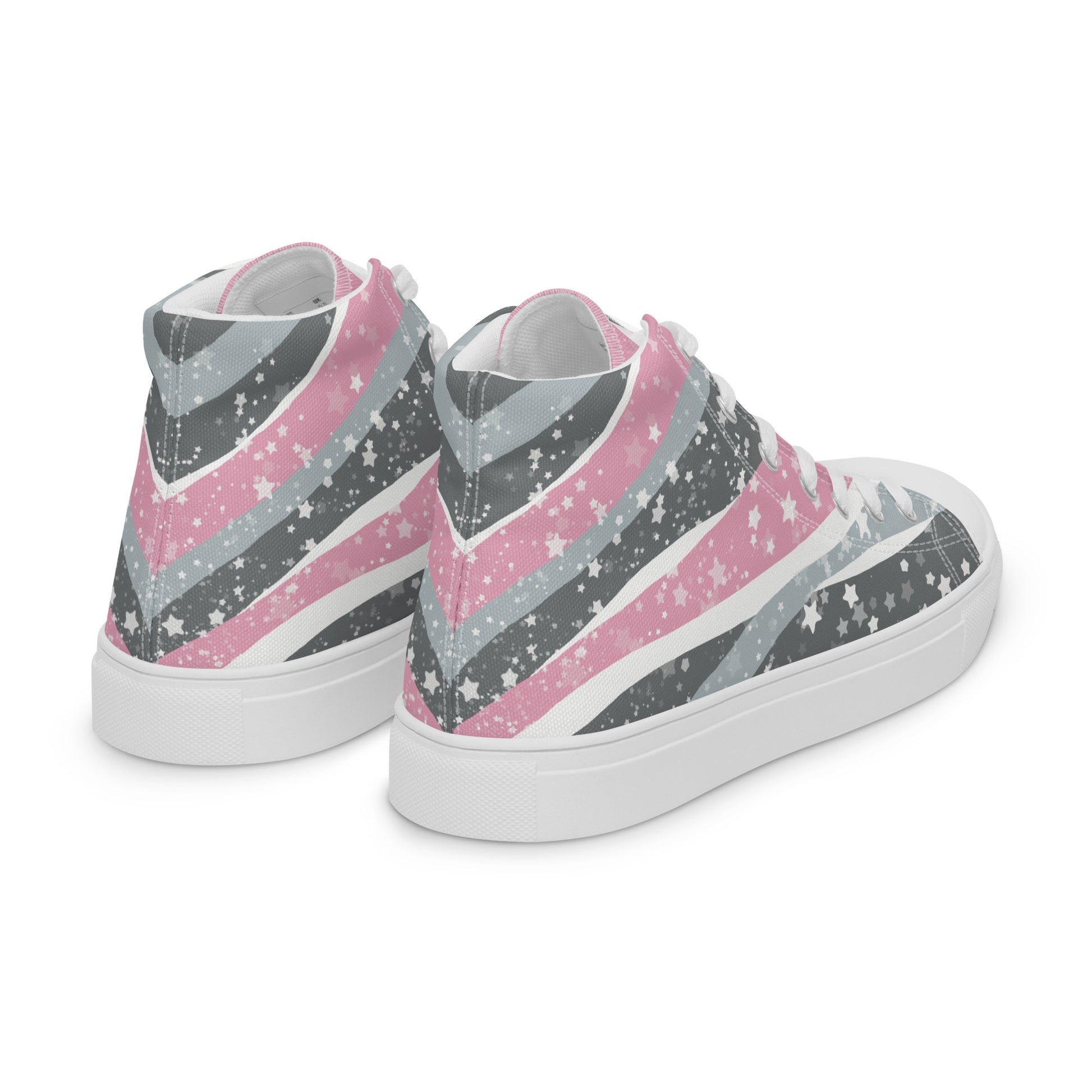 Right back view: A pair of high top shoes with ribbons of the demigirl flag colors and stars coming from the heel and getting larger across the shoe to the laces.