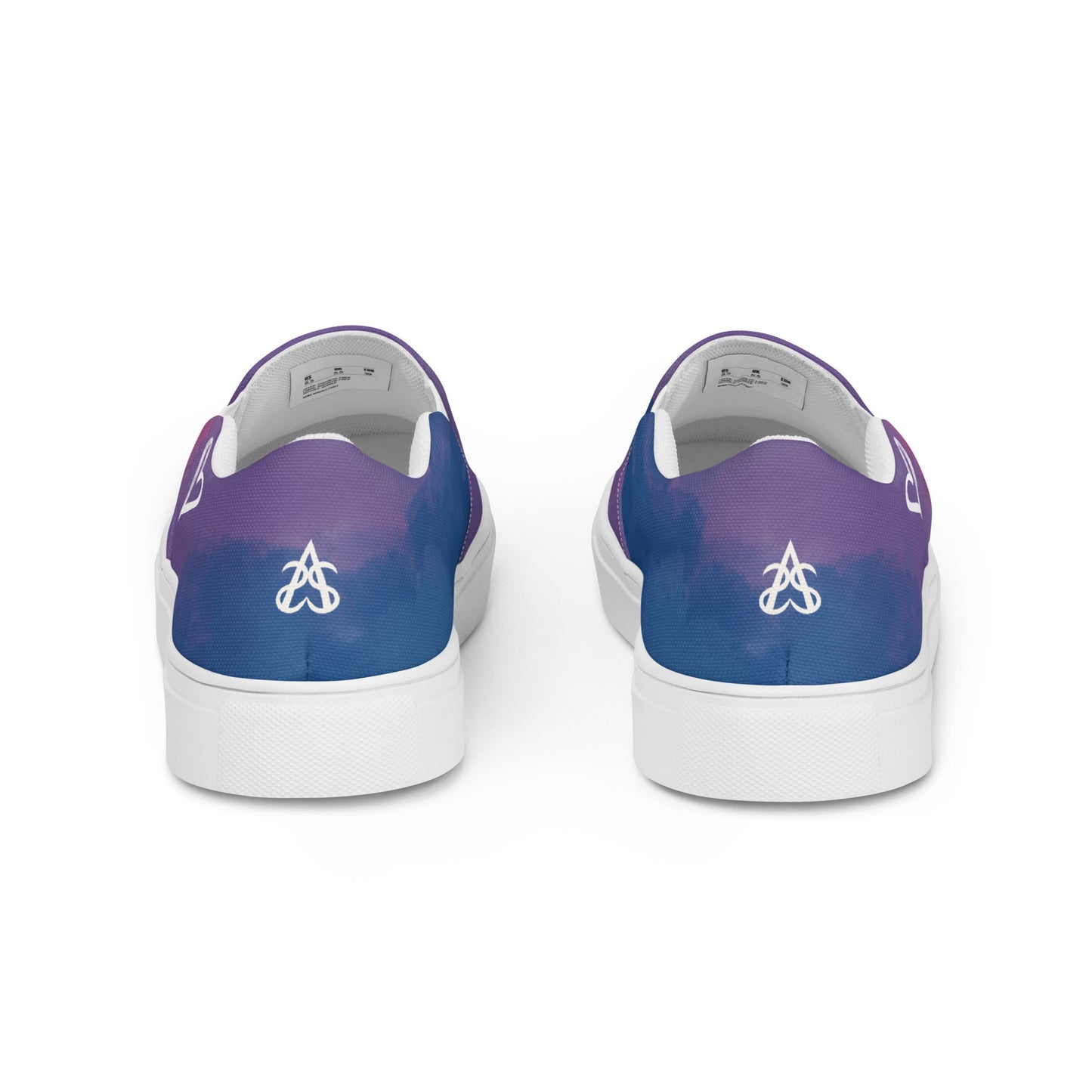 Back view: A pair of slip on shoes with color block pink, purple, and blue clouds, a white hand drawn heart, and the Aras Sivad logo on the back.