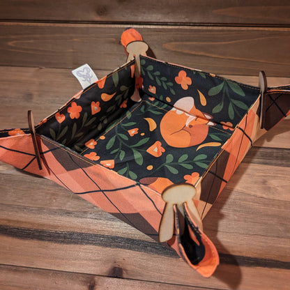 The Cozy Foxes pocket tray set up with the argyle print outside and wood clips in the corners.