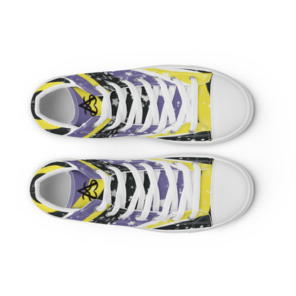 Top view: a pair of high-top shoes with ribbons of the yellow, purple, and black of the non-binary pride flag coming from the heel and expanding towards the laces with an explosion of stars over it, white accents, and the Aras Sivad Studio logo in black on the tongue.