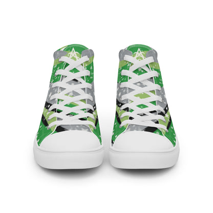 Front view: a pair of high-top shoes with ribbons of the greens, grey, and black of the aromantic pride flag coming from the heel and expanding towards the laces with an explosion of stars over it, white accents, and the Aras Sivad Studio logo in white on the tongue.