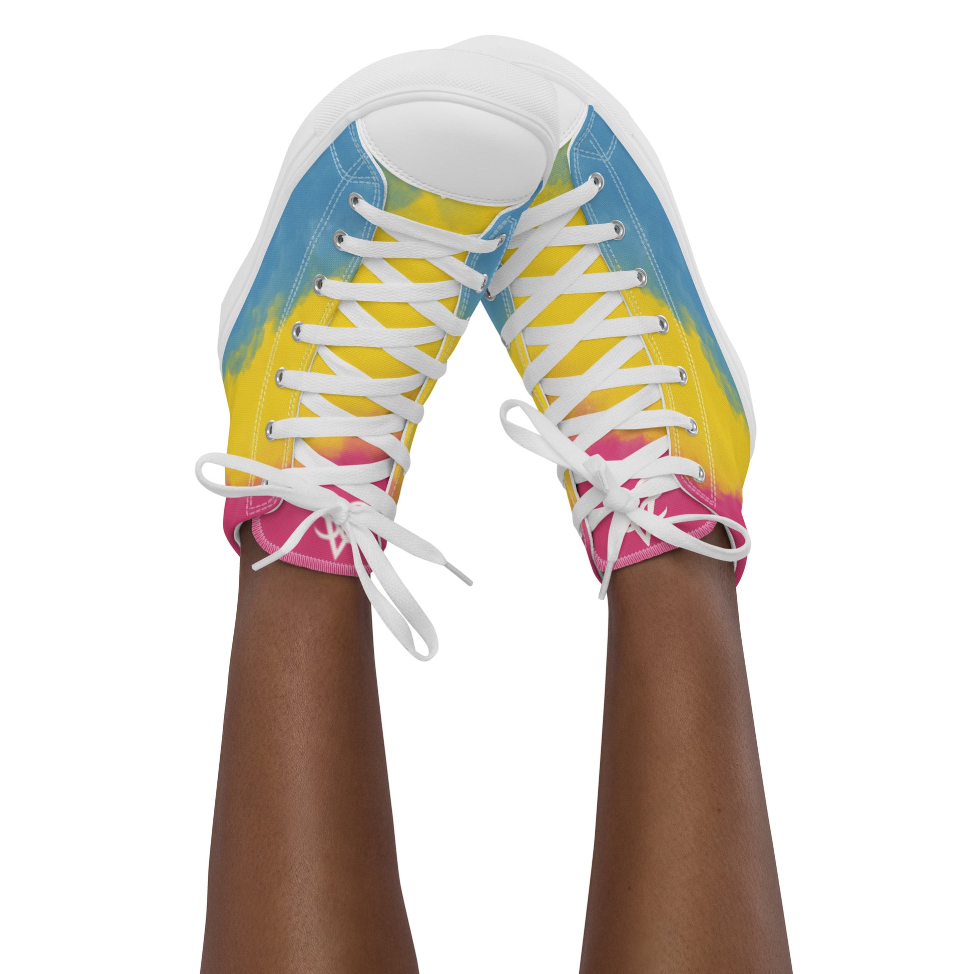 A model wears a pair of high top shoes with color block pink, yellow, and blue clouds, a white hand drawn heart, and the Aras Sivad logo on the back.