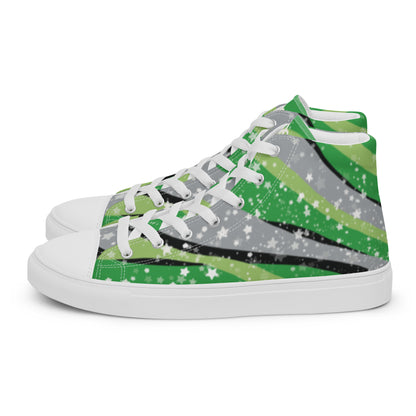 Left view: a pair of high-top shoes with ribbons of the greens, grey, and black of the aromantic pride flag coming from the heel and expanding towards the laces with an explosion of stars over it, white accents, and the Aras Sivad Studio logo in white on the tongue.
