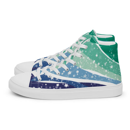 Left view: A pair of high top shoes with ribbons of the gay men flag colors and stars coming from the heel and getting larger across the shoe to the laces.