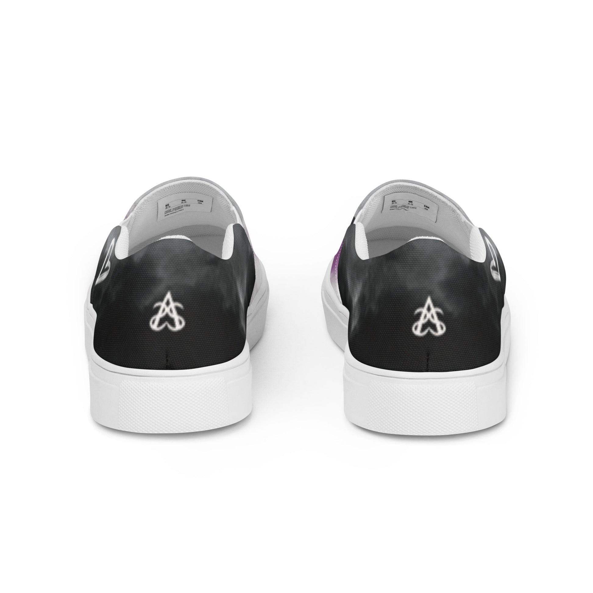 Back view: A pair of slip-on shoes with clouds in the asexual flag colors, a hand drawn white heart on the side, and the Aras Sivad Studio logo on the back.