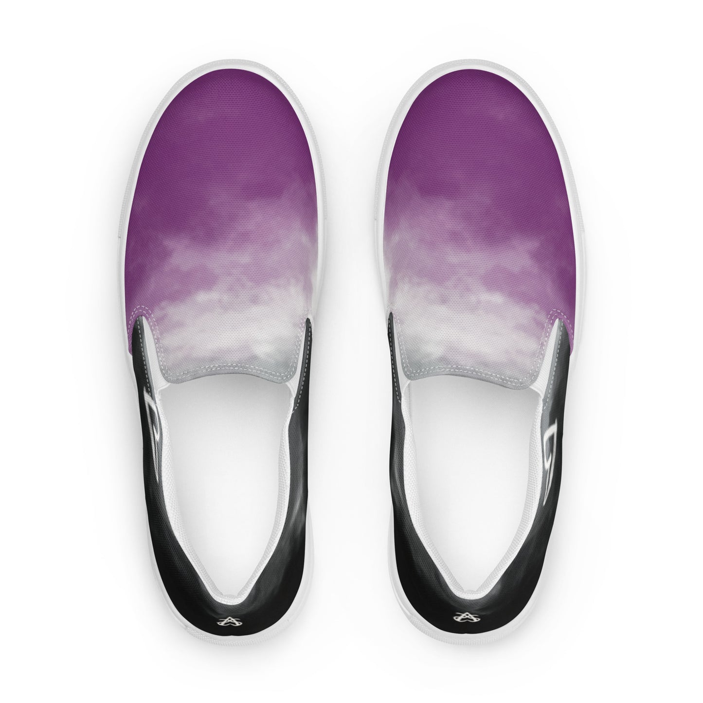 Top View: A pair of slip-on shoes with clouds in the asexual flag colors, a hand drawn white heart on the side, and the Aras Sivad Studio logo on the back.