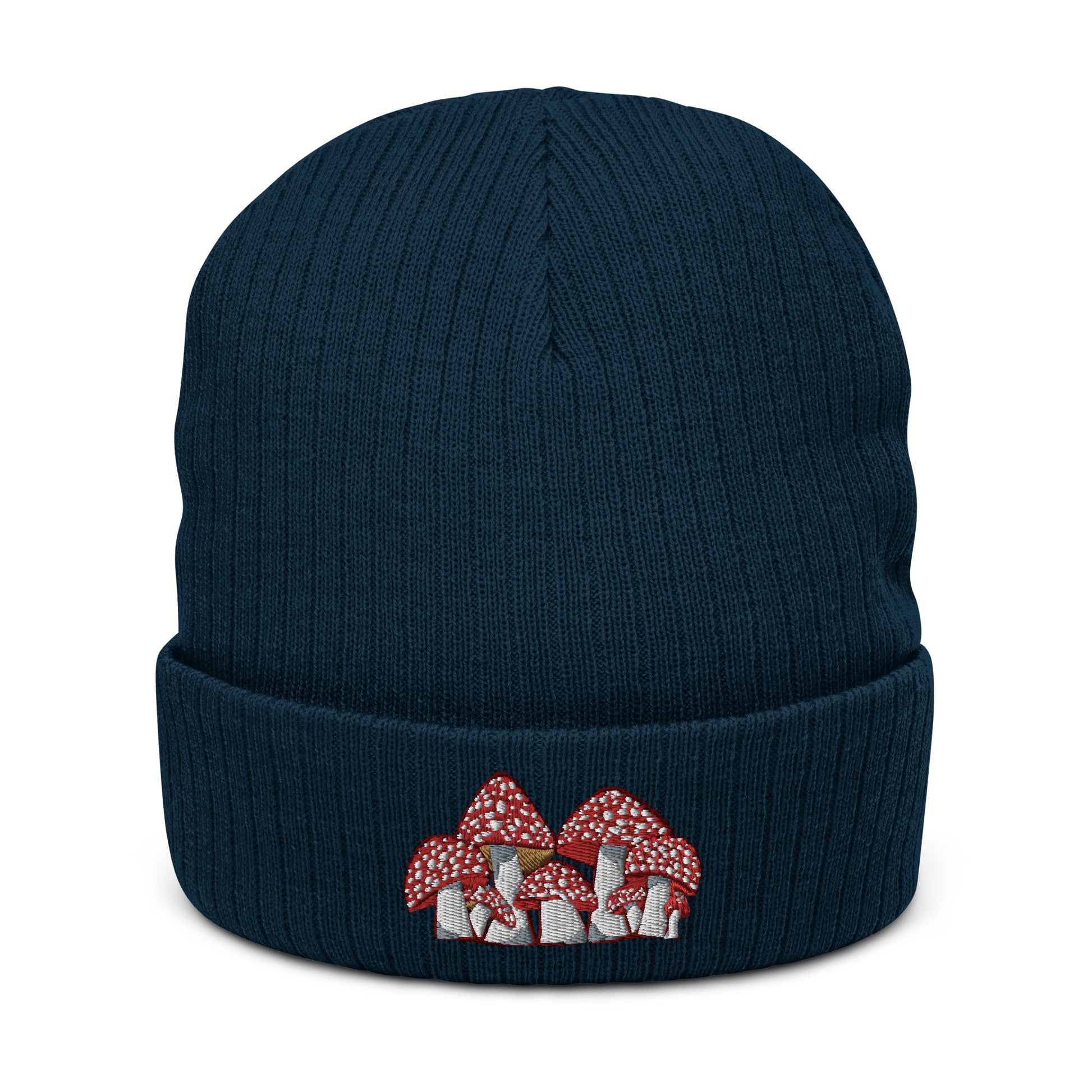A navy ribbed knit beanie has an embroidery of Fly Agaric mushrooms on the front.