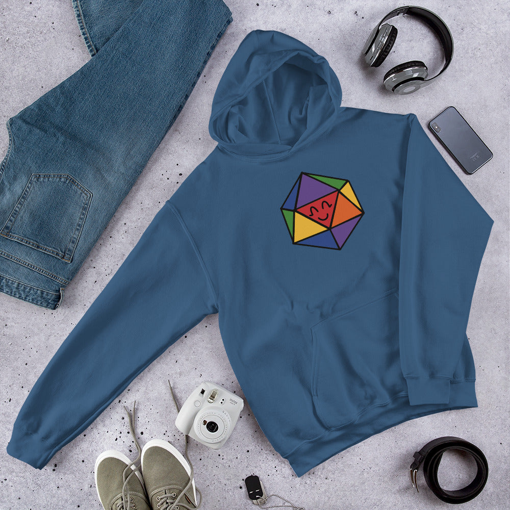 A pullover hoodie in indigo with a rainbow D20 illustration site with a generic outfit.